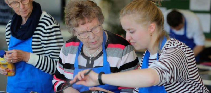 Foto met daarop de deelnemers aan de workshop Koken op inductie